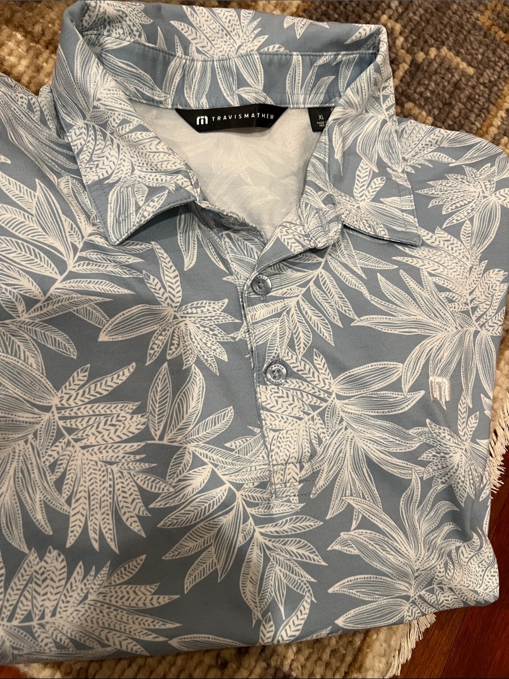 Travis Mathew Sky Blue Polo with White Leaf Print